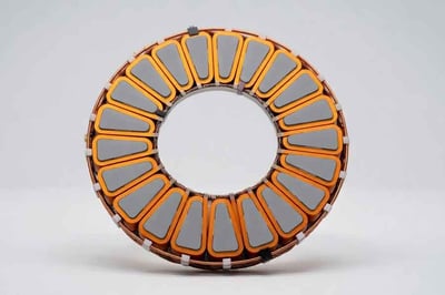 In axial flux motors, where high power density and short axial lengths demand efficient heat removal, lightweight aluminum or alloys excel to maintain torque-to-weight ratios