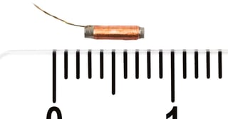 Micro coil core materials: from amorphous to neodymium