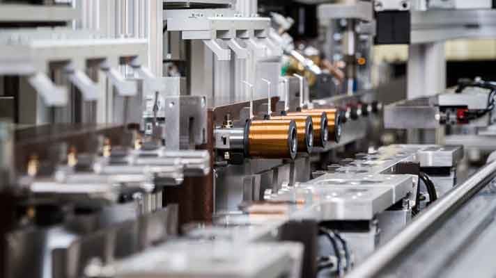 Coil manufacutring line for automotive solenoid valves in installation.