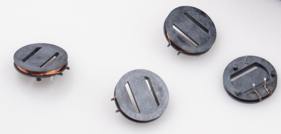 Customer-specific bobbin coil manufactured by KUK Group: At Elesta GmbH, it serves as an antenna in an RFID sensor.
